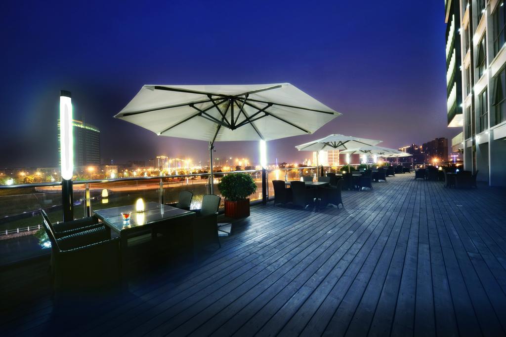 Vienna International Hotel Suzhou University Town Exterior photo